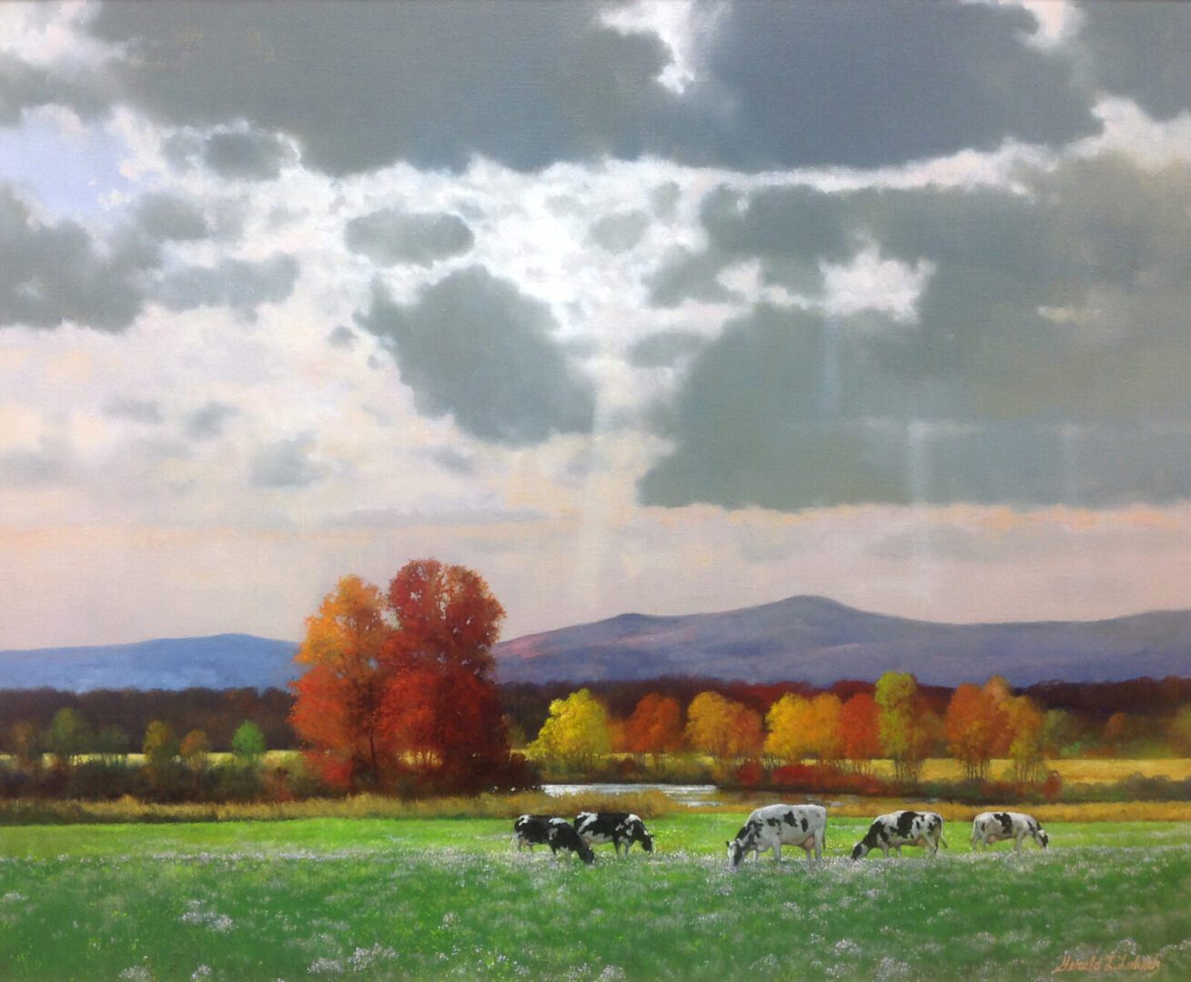A painting of cows grazing in a field.